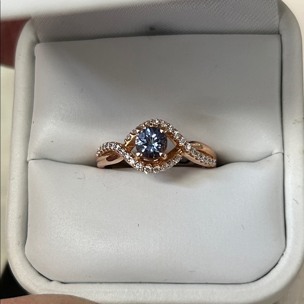 465311 14k Rg diamond and Tanzanite ring